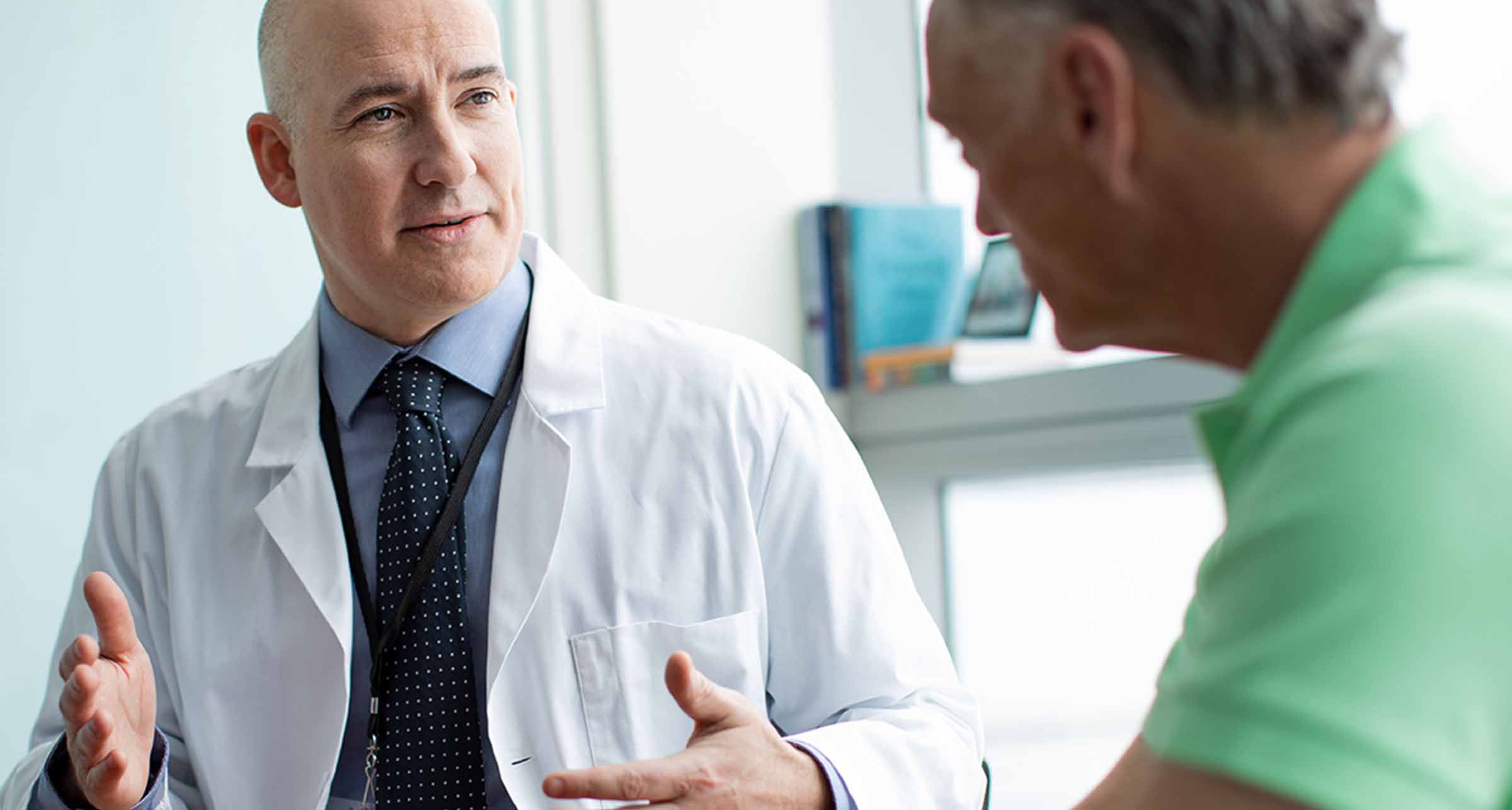 Physician talking to a patient.