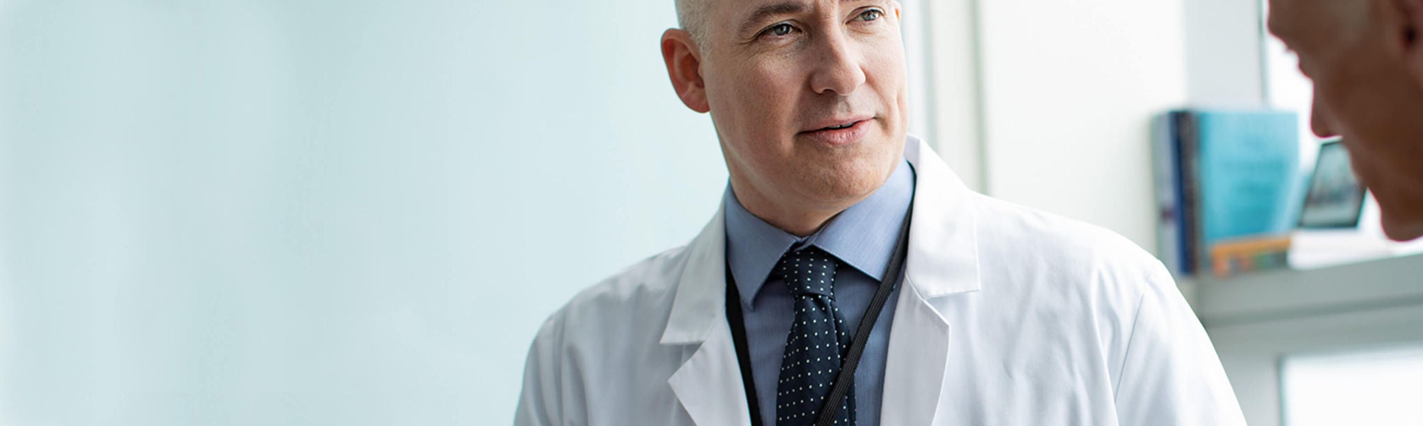 Physician talking to a patient.