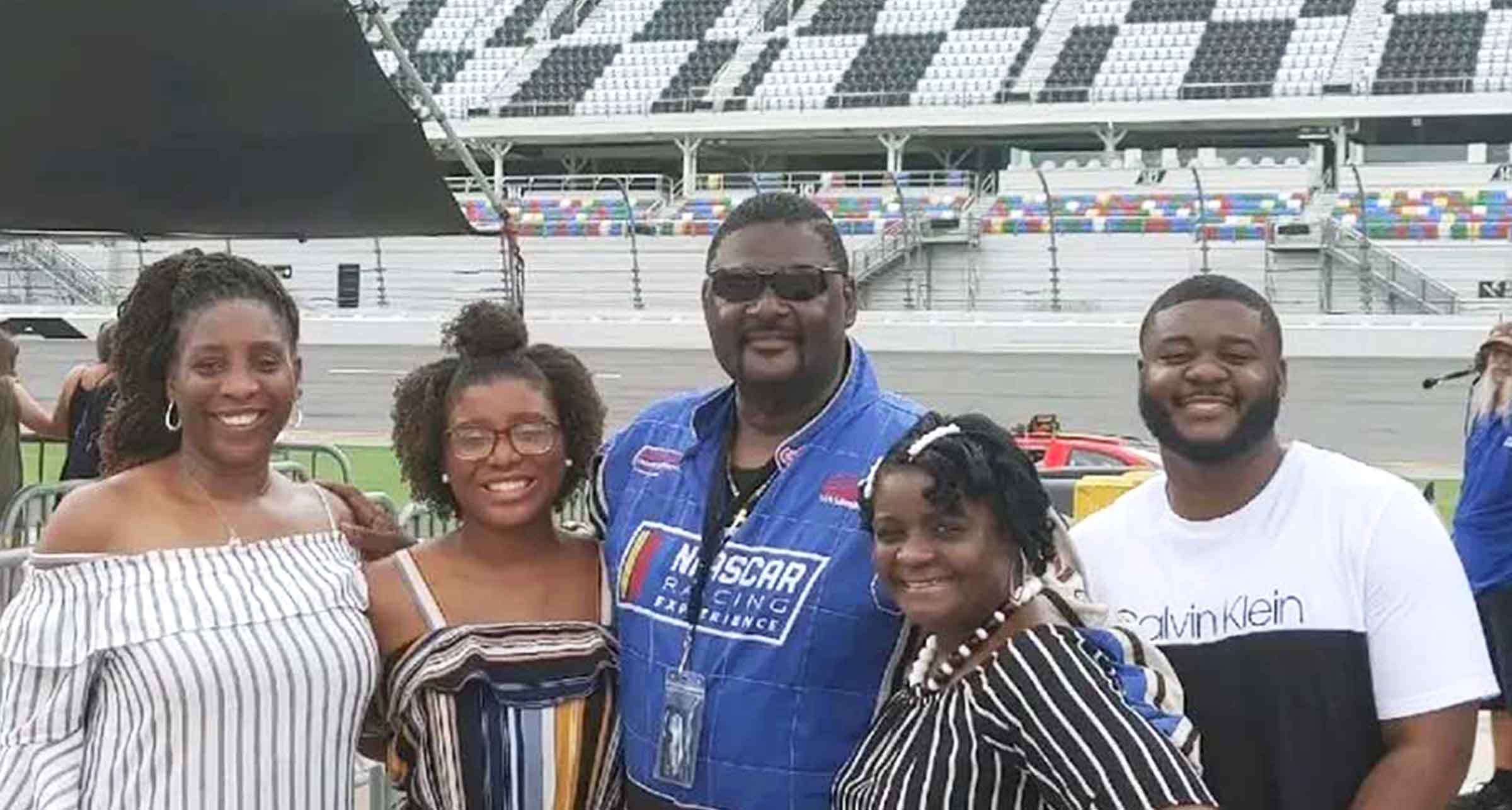 Football coach, Steve, and his family at the race track.