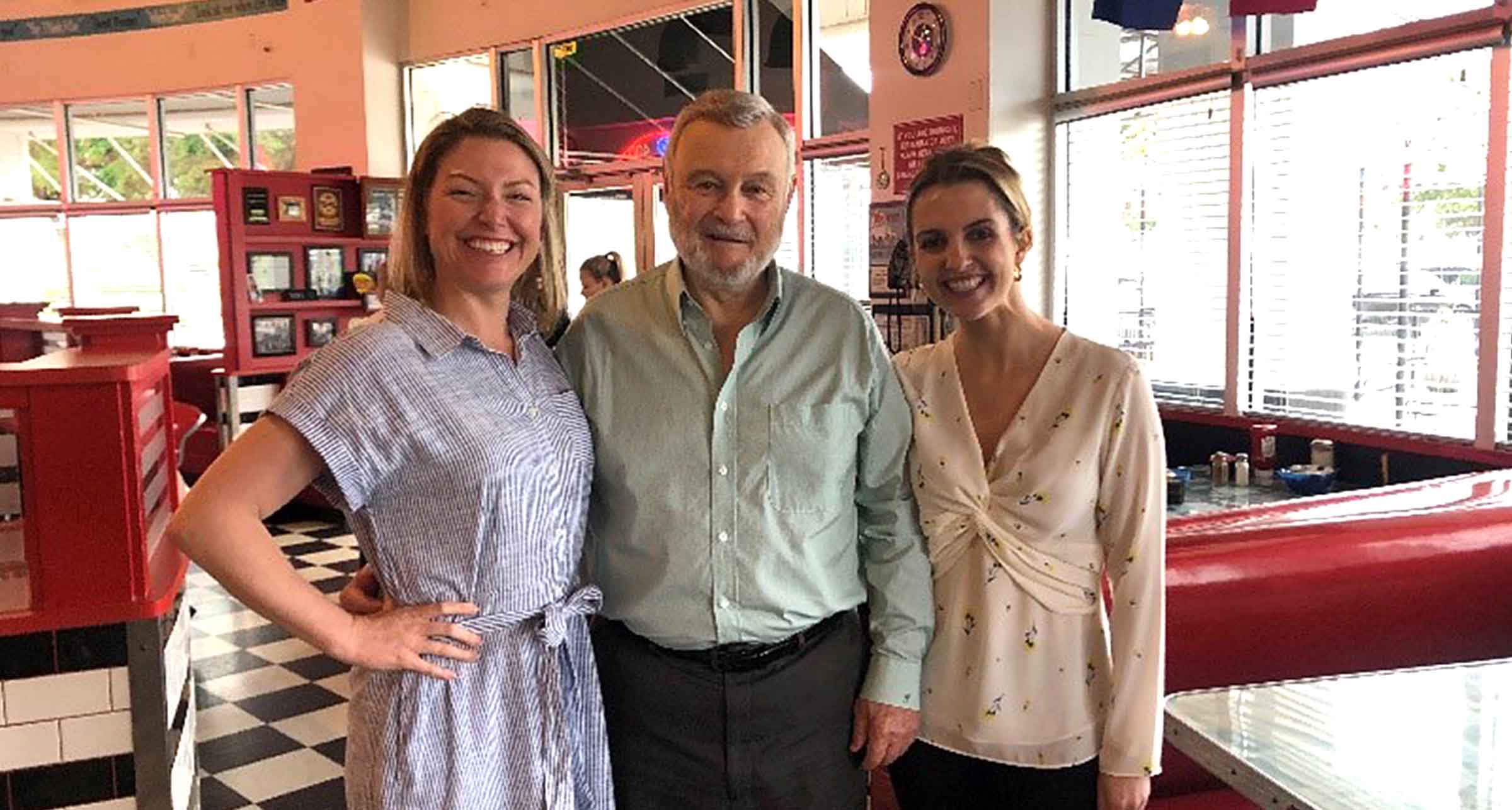 Patient Pierre standing with SpaceOAR™ Hydrogel nurse and sales manager.