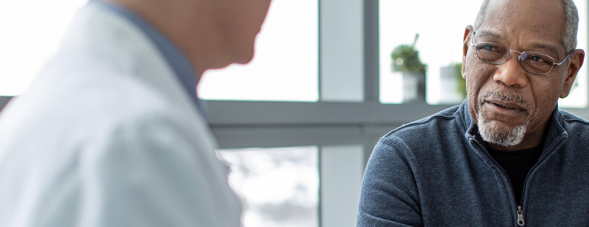 Doctor and patient consultation.